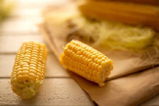 You should break corn into two halves to microwave it more quickly
